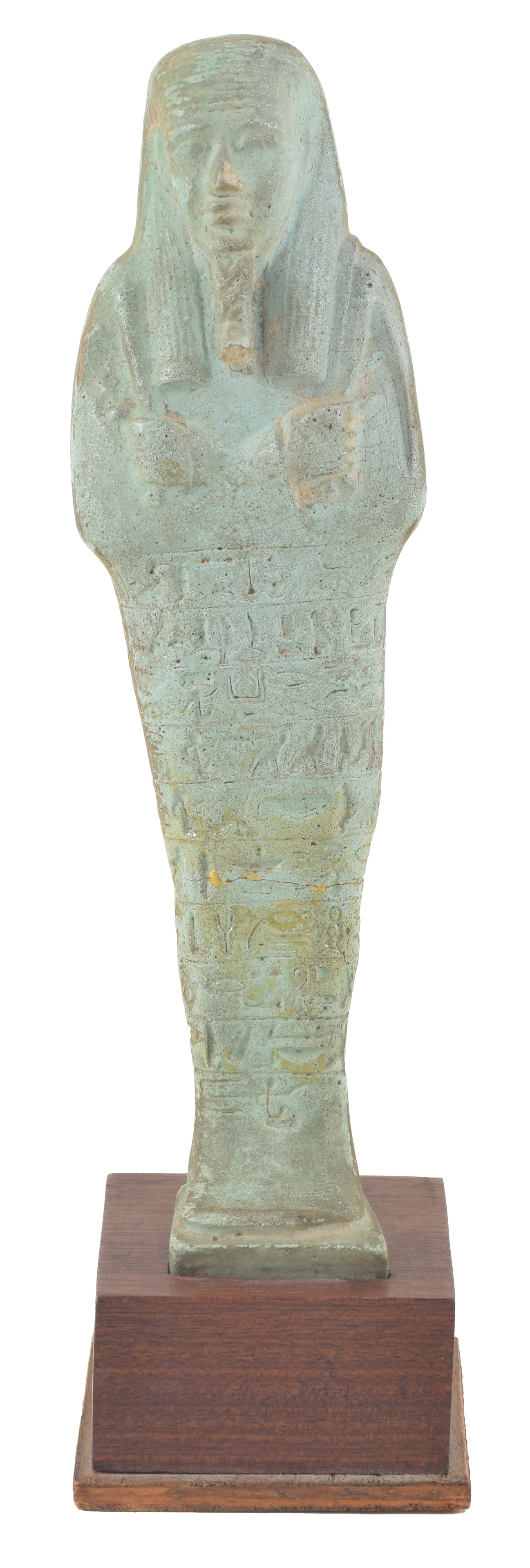 Egyptian, 26th/30th dynasties, turquoise faience ushabti figure. Modeled with pick and hoe and ten- (1 of 7)