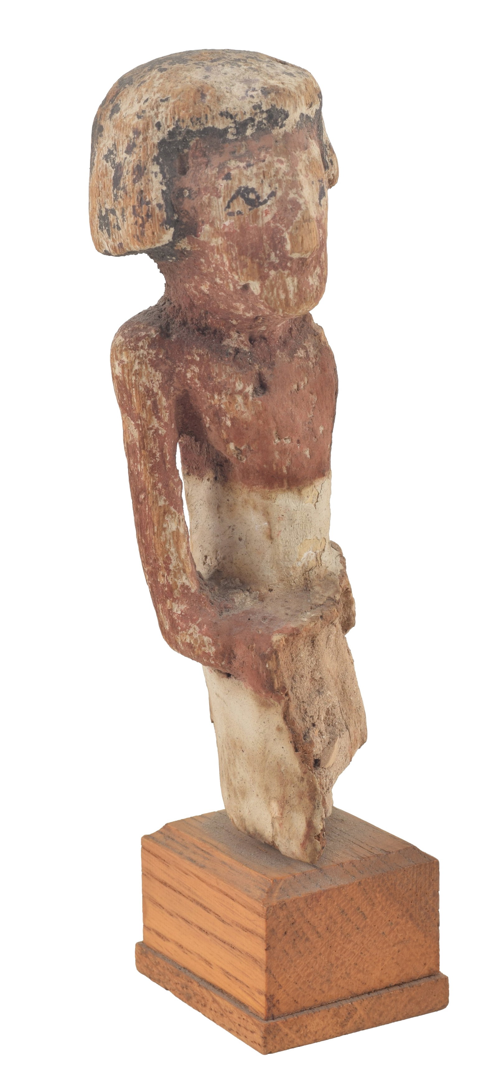 Egyptian, 12th Dynasty, painted wood figure of funerary boatman. Short black wig, white garment. (1 of 5)