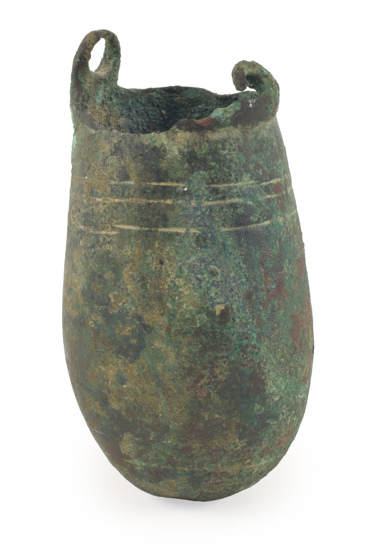 Egyptian, Late Period, bronze situla with incised lines and partial handles. Height 3 in. From the: Egyptian, Late Period, bronze situla with incised lines and partial handles. Height 3 in. From the collection of Dr. Bruce L. Ralston, Tuxedo Park NY. Dr. Ralston assembled a large collection during t