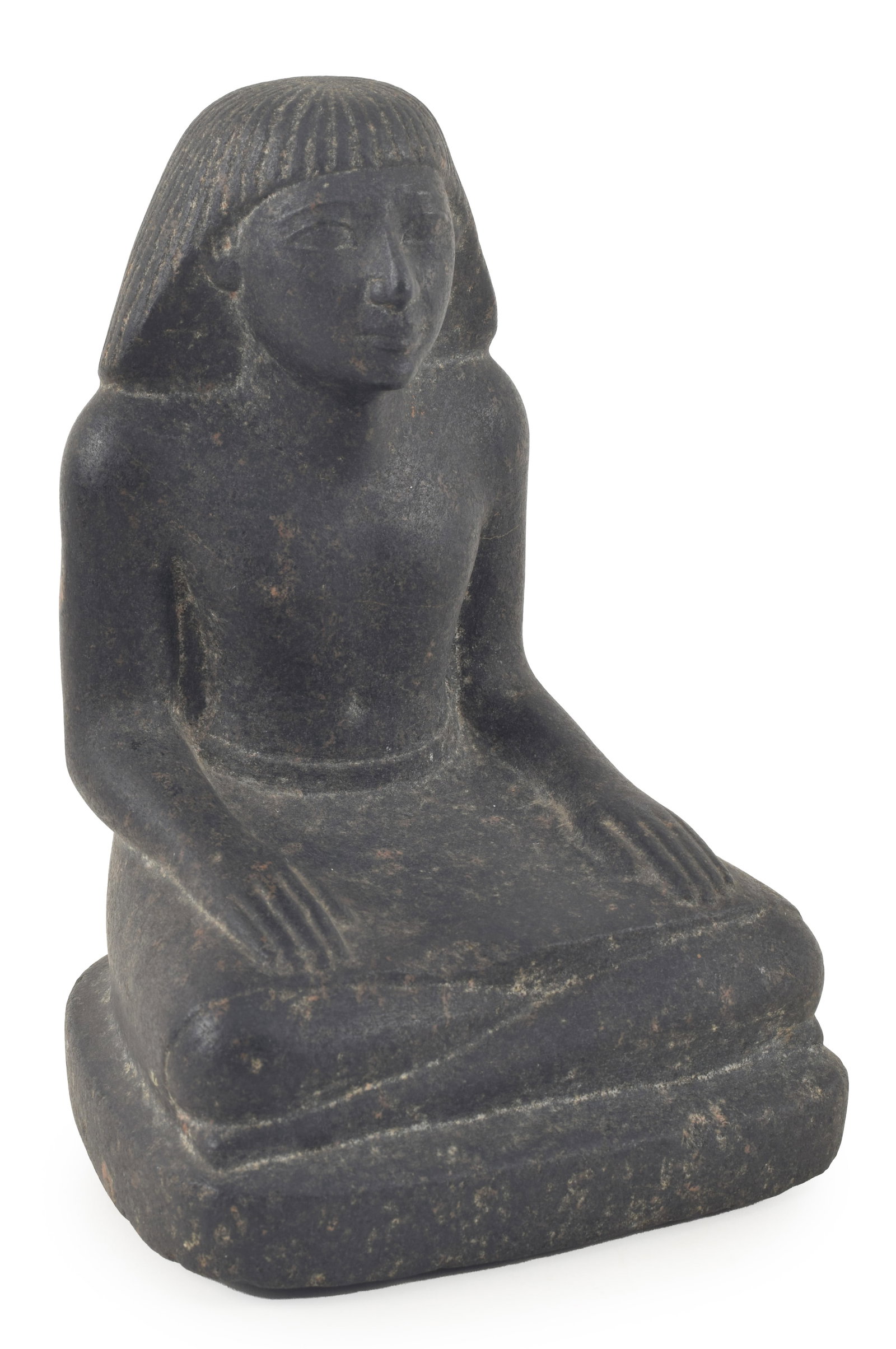 Egyptian likely carved black granite figure of a kneeling scribe. Not Ancient. Height 7.25 in, width: Egyptian likely carved black granite figure of a kneeling scribe. Not Ancient. Height 7.25 in, width 5.25 in, depth 5 in. From the collection of Dr. Bruce L. Ralston, Tuxedo Park NY. Dr. Ralston assem