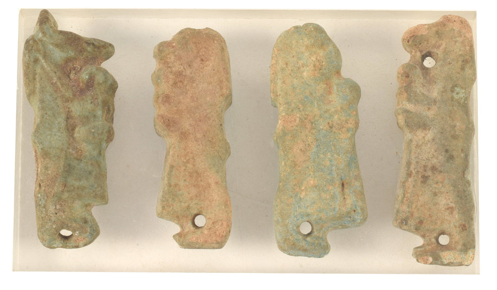 [4] Egyptian, Late Period, faience amulets of animal deities. Mounted on plexi panel. Heights 1.75 (1 of 4)
