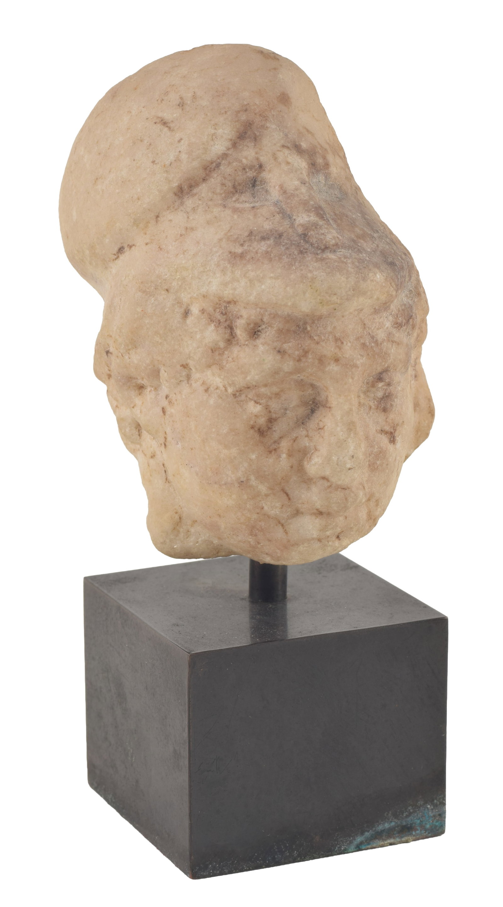 Green carved stone head of a soldier, fragment. White marble. On a stone base.. Height 3.5 in. From: Green carved stone head of a soldier, fragment. White marble. On a stone base.. Height 3.5 in. From the collection of Dr. Bruce L. Ralston, Tuxedo Park NY. Dr. Ralston assembled a large collection dur