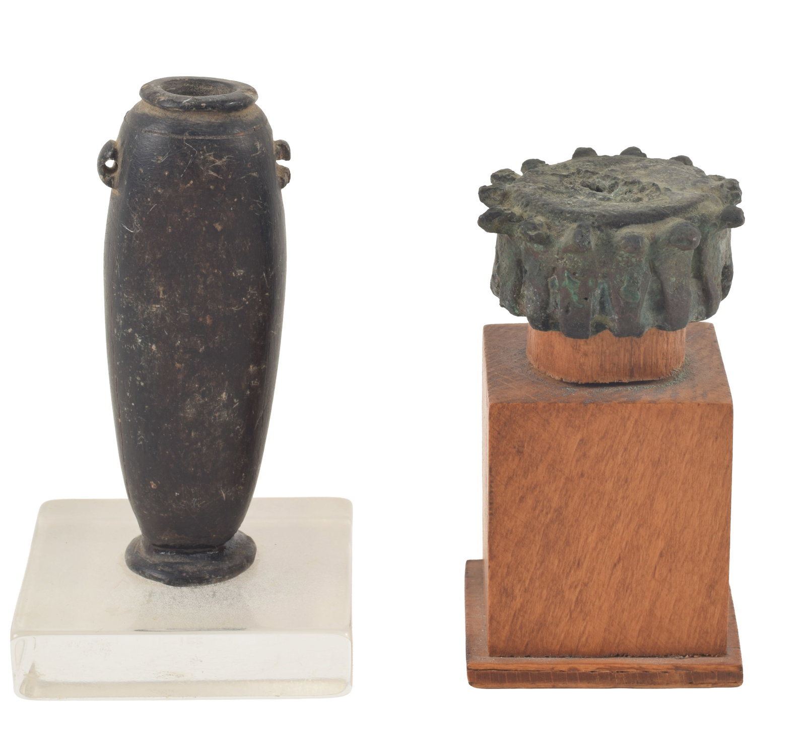 2 Ancient items, including an Egyptian small carved vessel and a bronze crown form capital or mold.: 2 Ancient items, including an Egyptian small carved vessel and a bronze crown form capital or mold. Heights 3 in, 0.75 in. From the collection of Dr. Bruce L. Ralston, Tuxedo Park NY. Dr. Ralston asse
