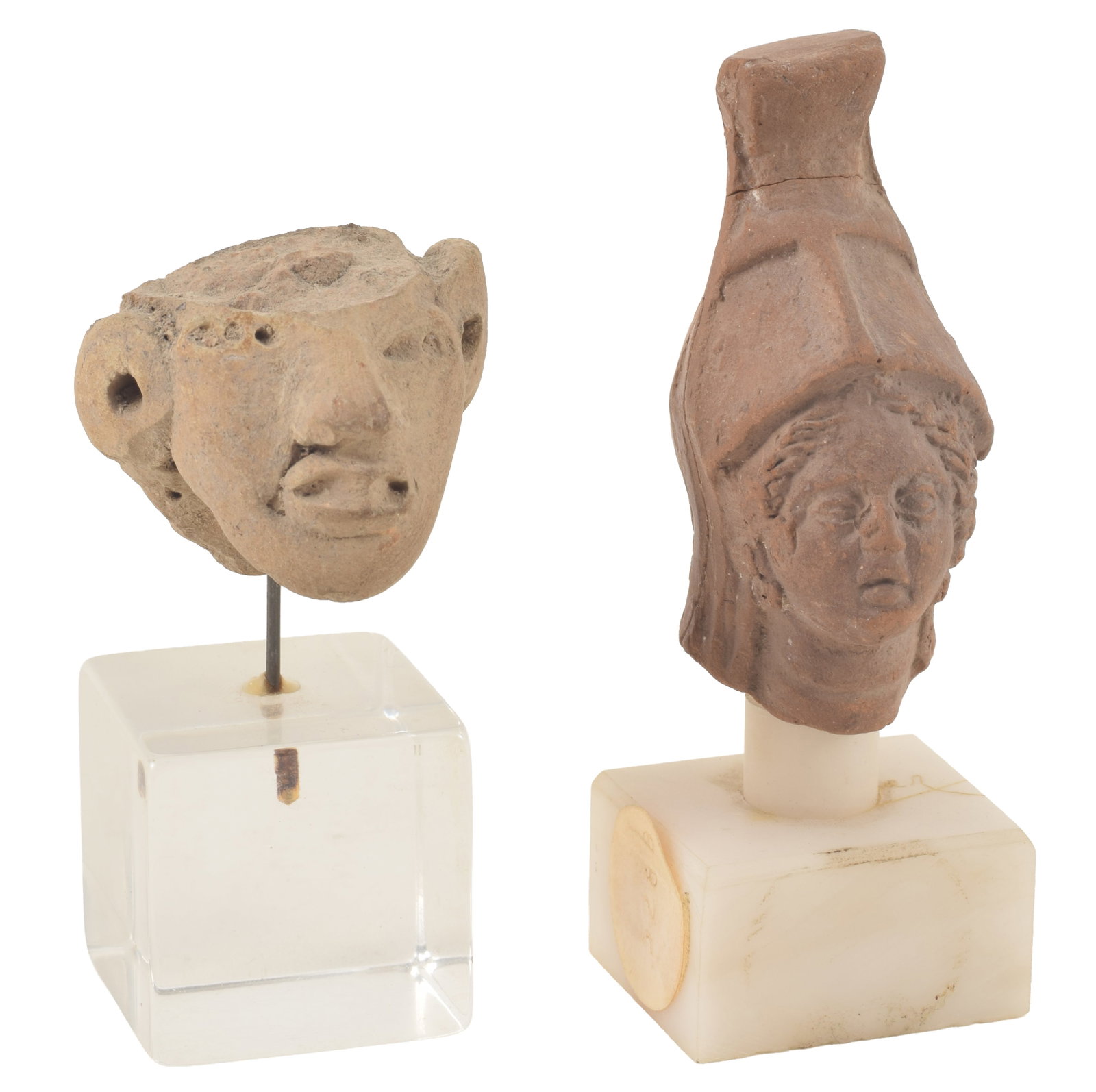 2 Ancient pottery heads, including a Hellenistic female with helmet and a pre-Colombian fragment. (1 of 4)