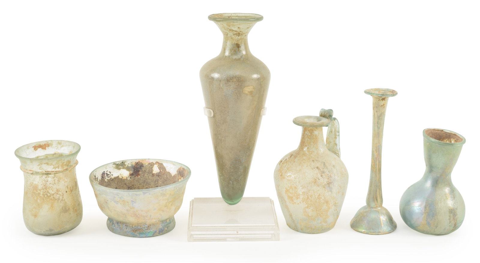 Collection of 6 Roman glass vessels including an open cup, a glass amphora, a slender vase, small (1 of 14)