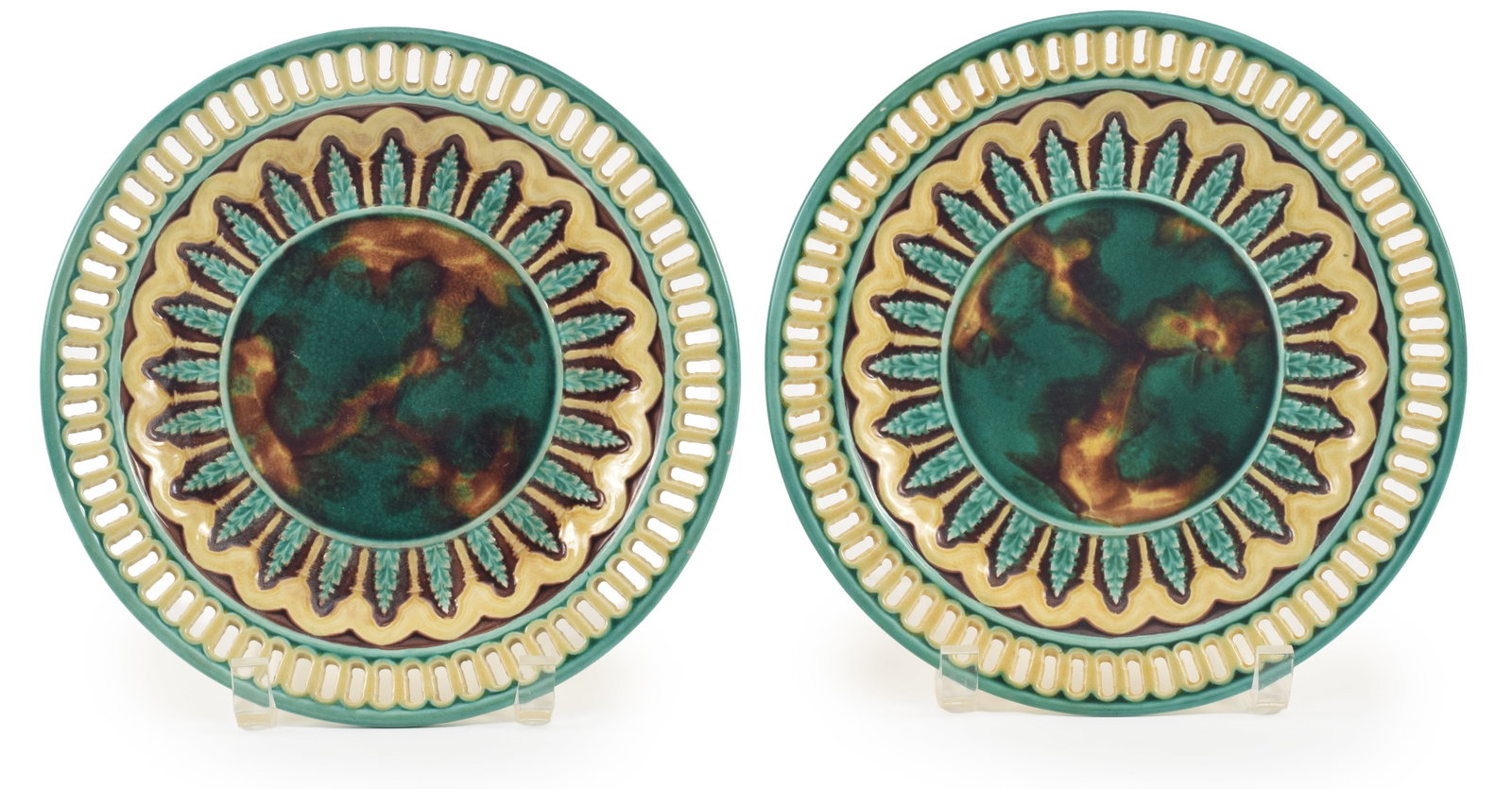 Pair of Wedgwood majolica plates with reticulated lattice edge, around molded florets and a mottled (1 of 5)