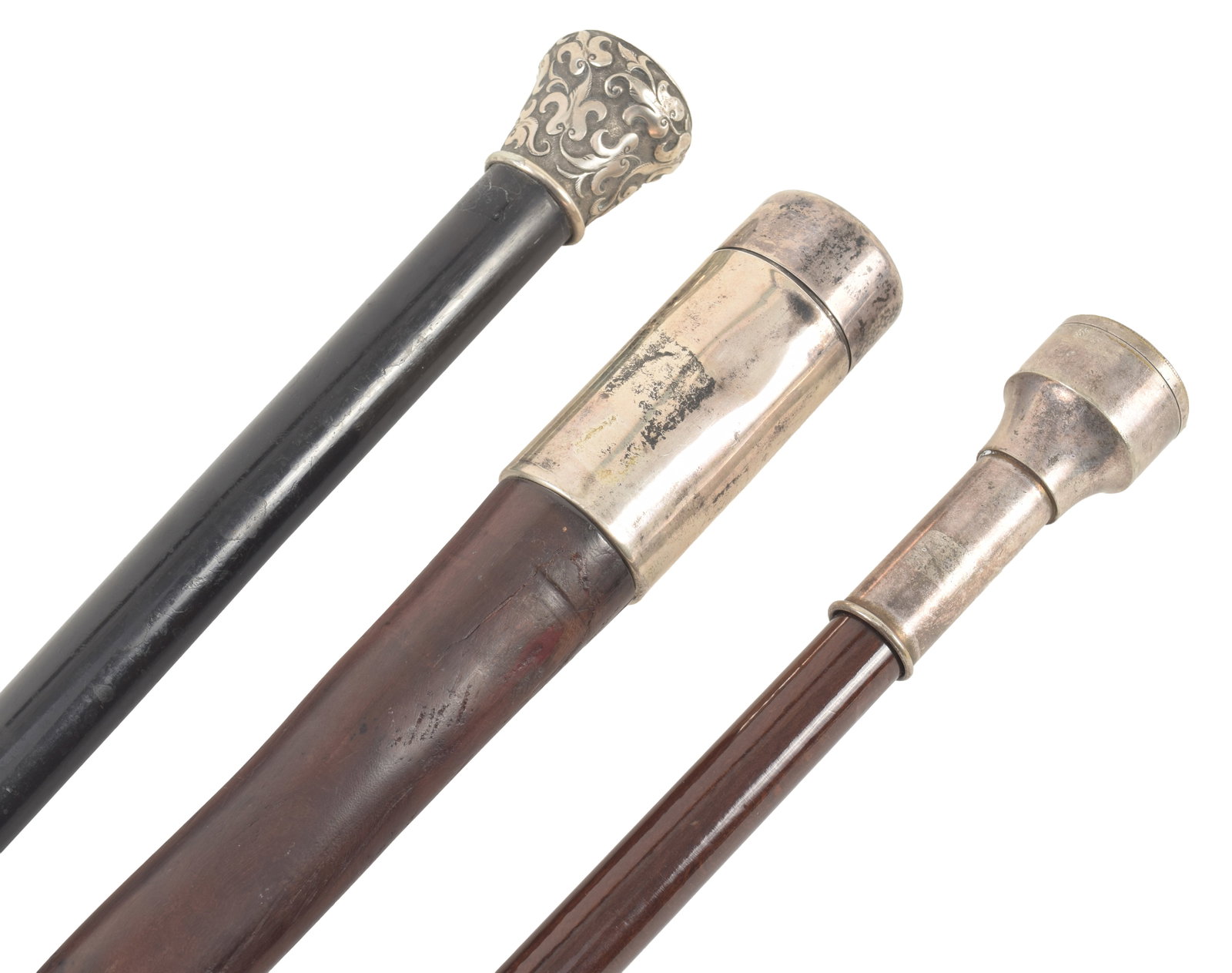 3 19th Century silver top canes, including a 1865 Civil War Commemorative to William Stetler, a: 3 19th Century silver top canes, including a 1865 Civil War Commemorative to William Stetler, a screw top with inset figure of a Walking Liberty and a screw top with London hallmarks fitted with barbe