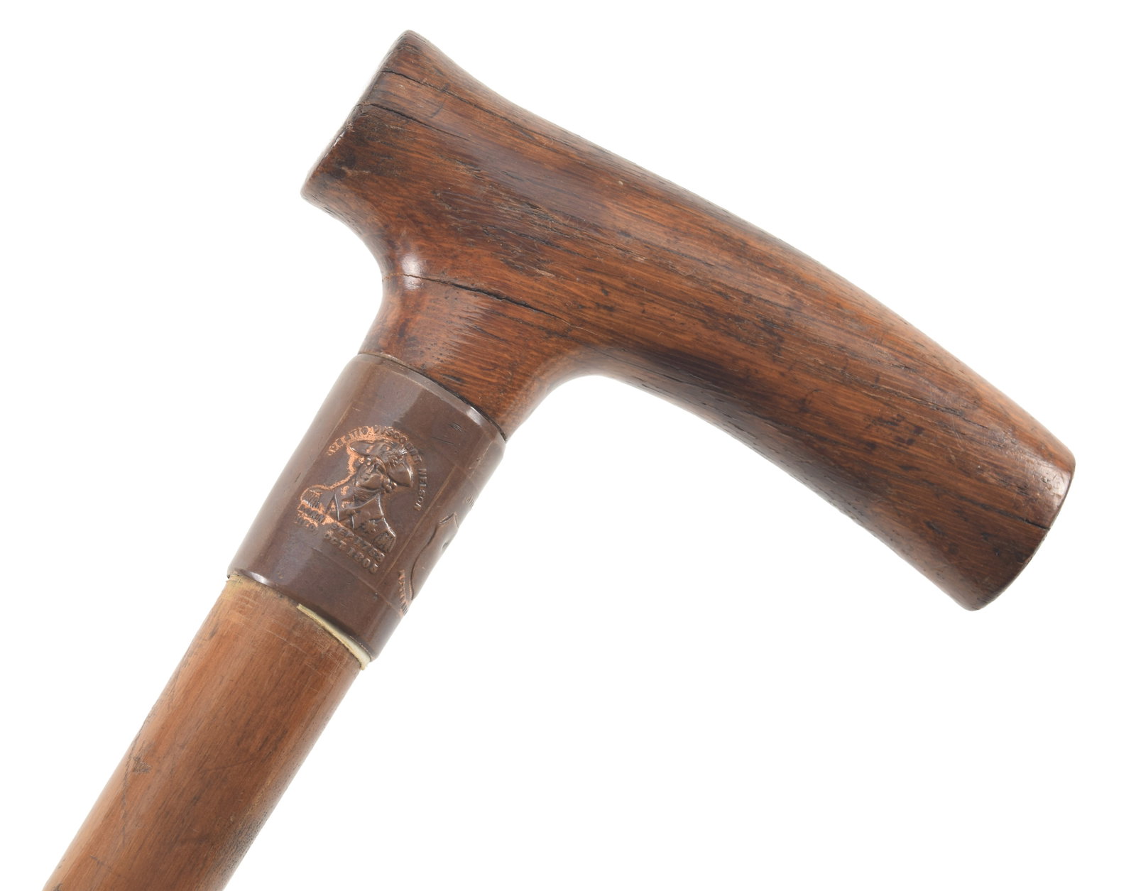Admiral Nelson commemorative walking stick with embossed copper band with memorial, the wood likely: Admiral Nelson commemorative walking stick with embossed copper band with memorial, the wood likely from the H.M.S. Victory. Length 32 in. Provenance: From the Rex Stark collection of Gardner, Massach