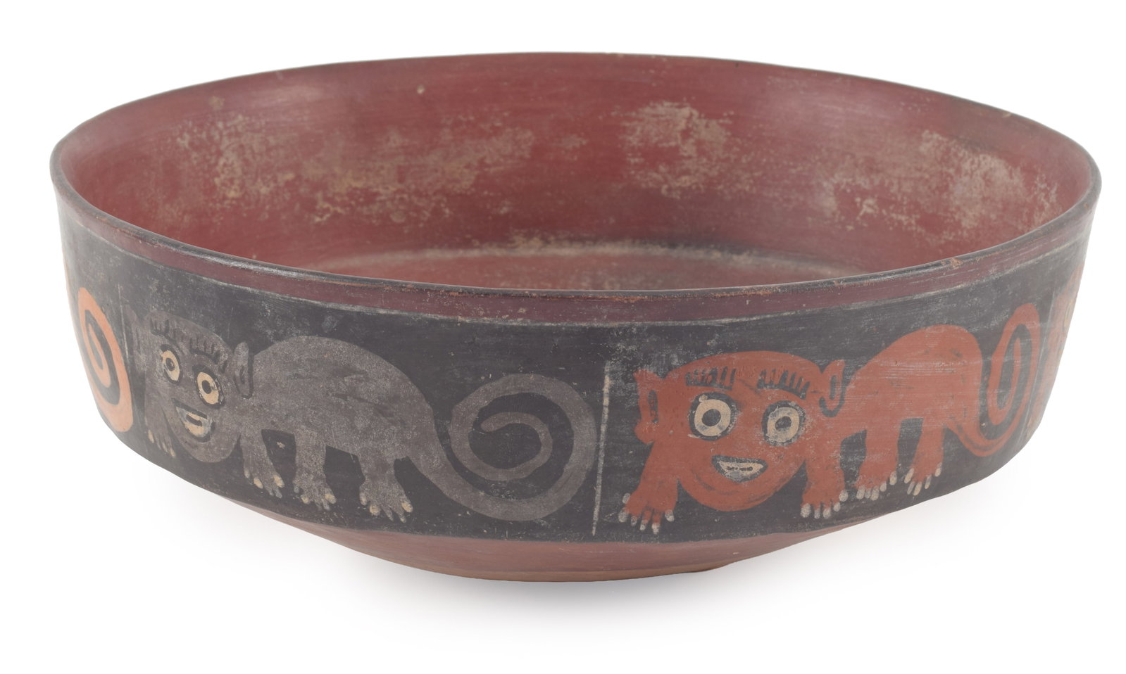 Nazca, circa 400 A.D. Shallow bowl with red glaze and a perimeter frieze of stylized cat figures on (1 of 5)