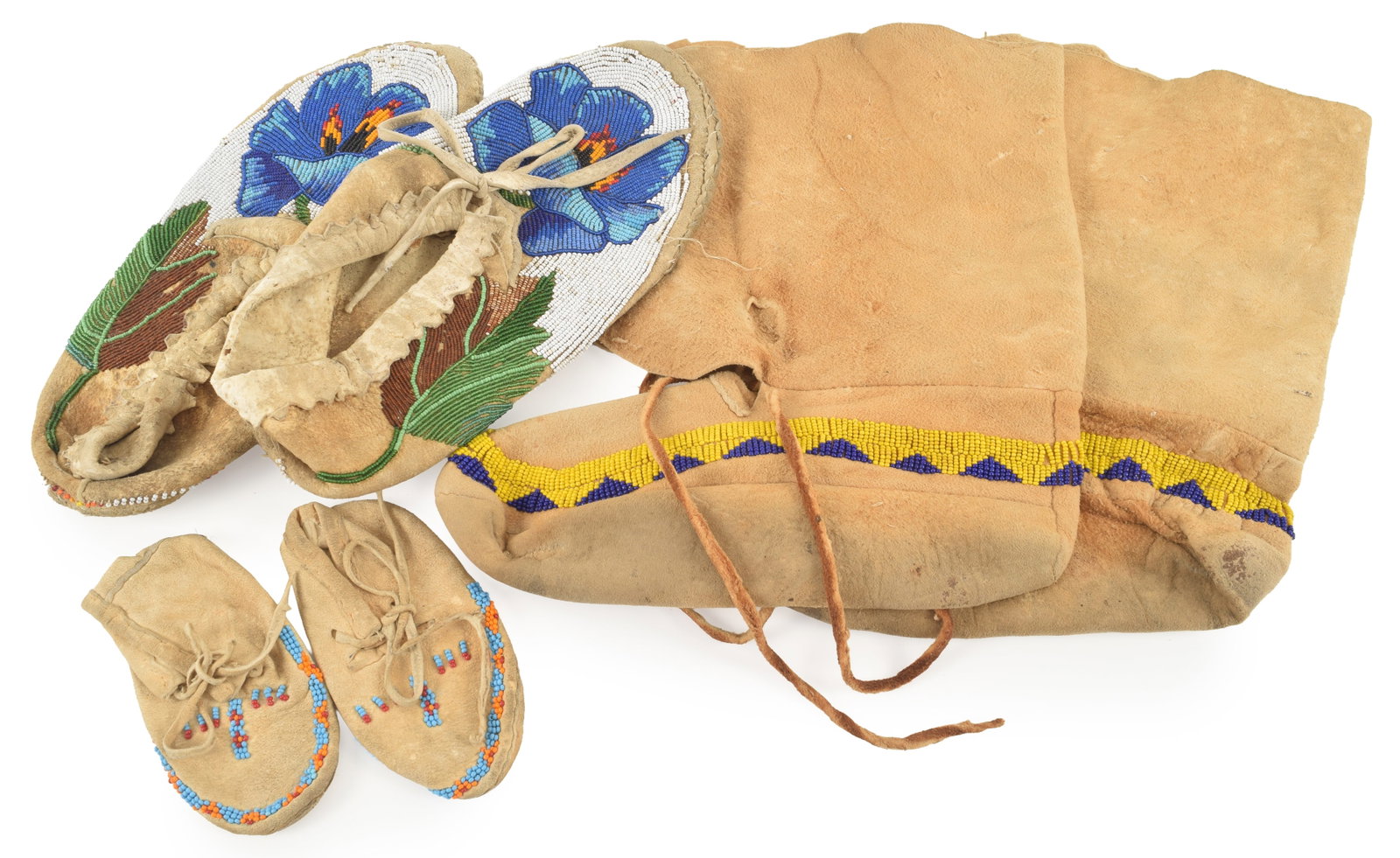 3 sets of Native American deerskin foot ware including a finely beaded Plains moccasins, a pair of (1 of 9)