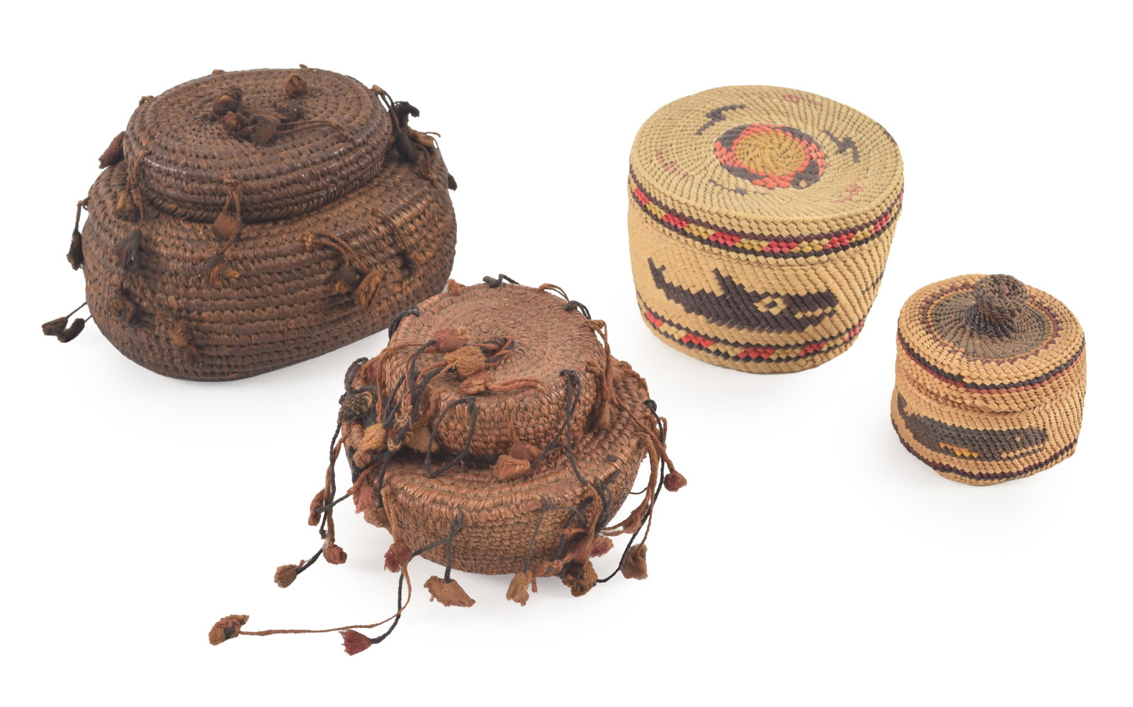 4 Northwest Coast American Indian baskets. 2 coiled lidded baskets with fabric tassels; 2 woven (1 of 10)