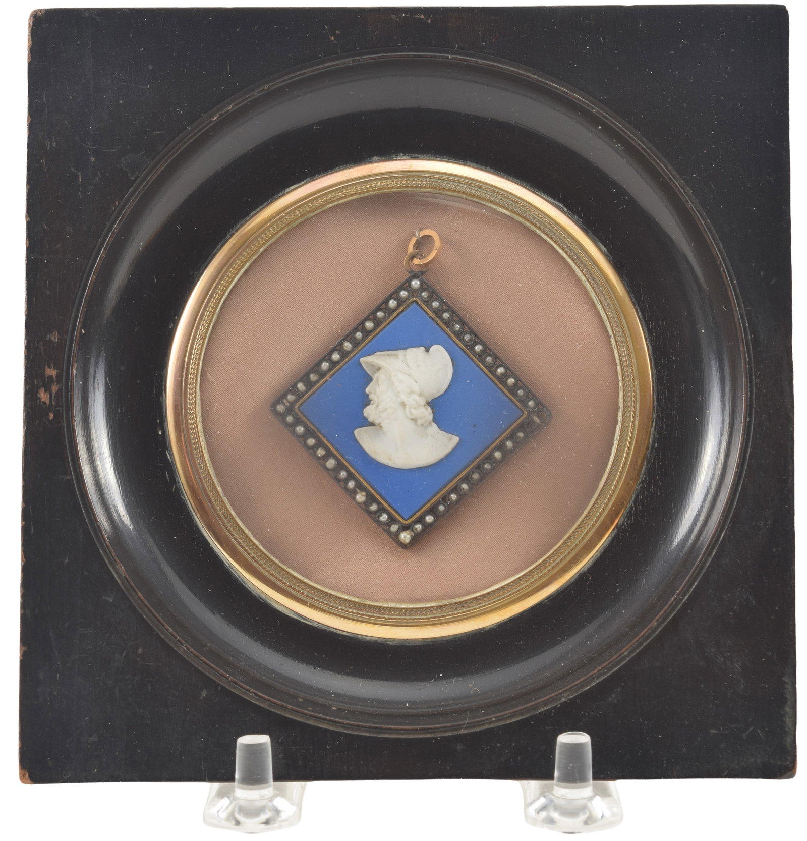 19th century jasperware pendant depicting the bust of a classical Greek figure wearing a helmet.: 19th century jasperware pendant depicting the bust of a classical Greek figure wearing a helmet. Silver and seed pearl mounted frame. Antique wood and gilt metal frame. 5 x 5in overall.