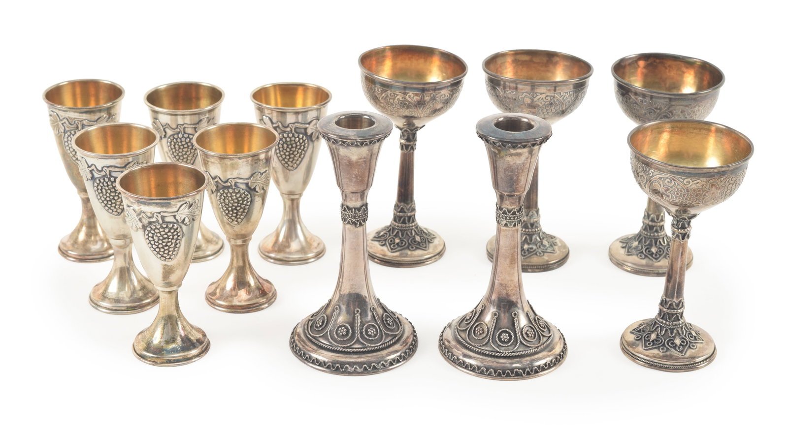 12 pieces of continental silver items. To include: 1) Set of 6 cordial or liquor shots 800 Silver.: 12 pieces of continental silver items. To include: 1) Set of 6 cordial or liquor shots 800 Silver. Maker's mark is on the bottom rim. Embossed images of grapevines. 2.75 inch high. 2.9 ozt. 2) Special
