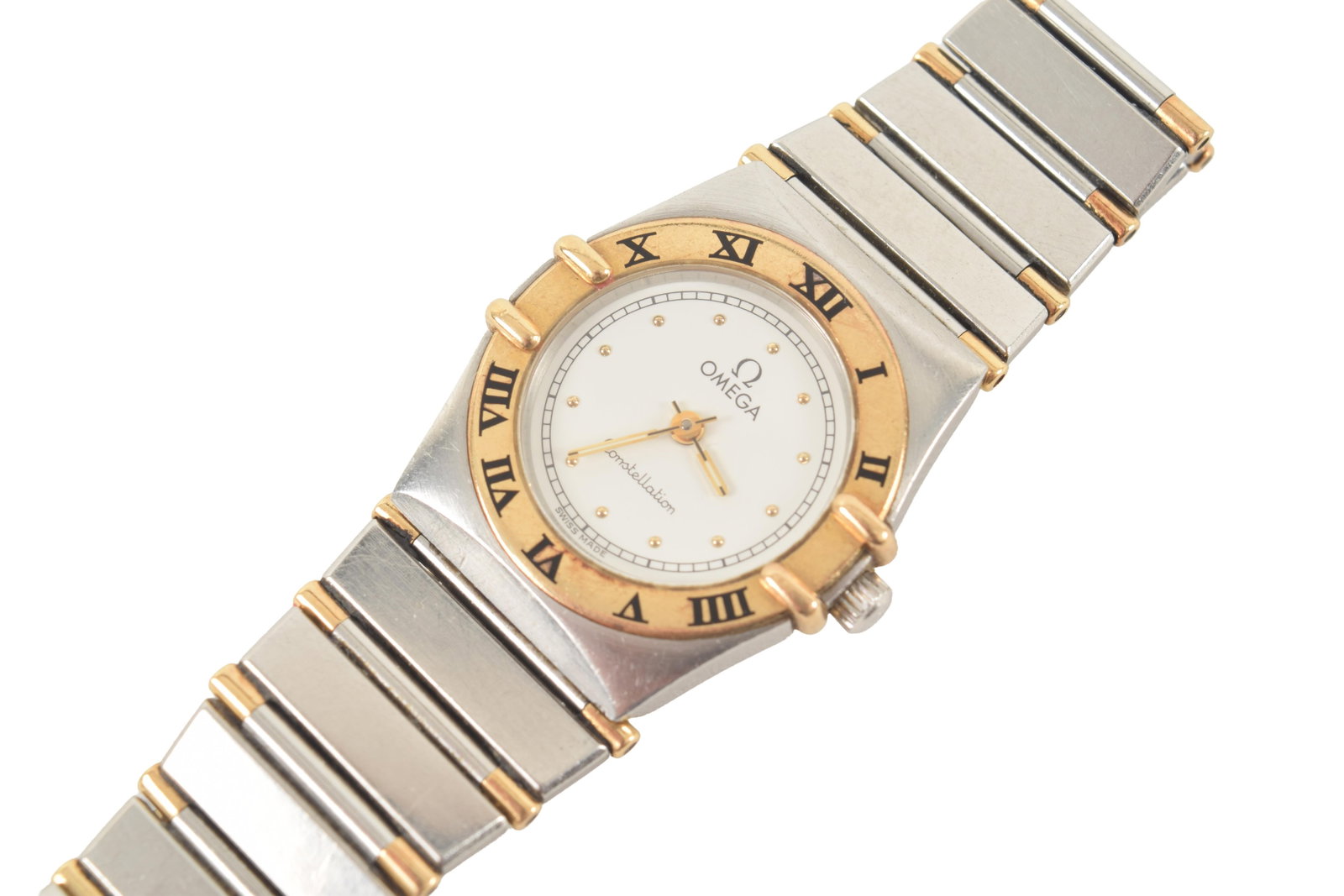 Omega Constellation "Mini" stainless steel and 18K gold ladies quartz wristwatch. Bezel with Roman: Omega Constellation "Mini" stainless steel and 18K gold ladies quartz wristwatch. Bezel with Roman numerals. Case back engraved L.F.S. - 20 Yr. Anniversary with the Constellation observatory emblem. B