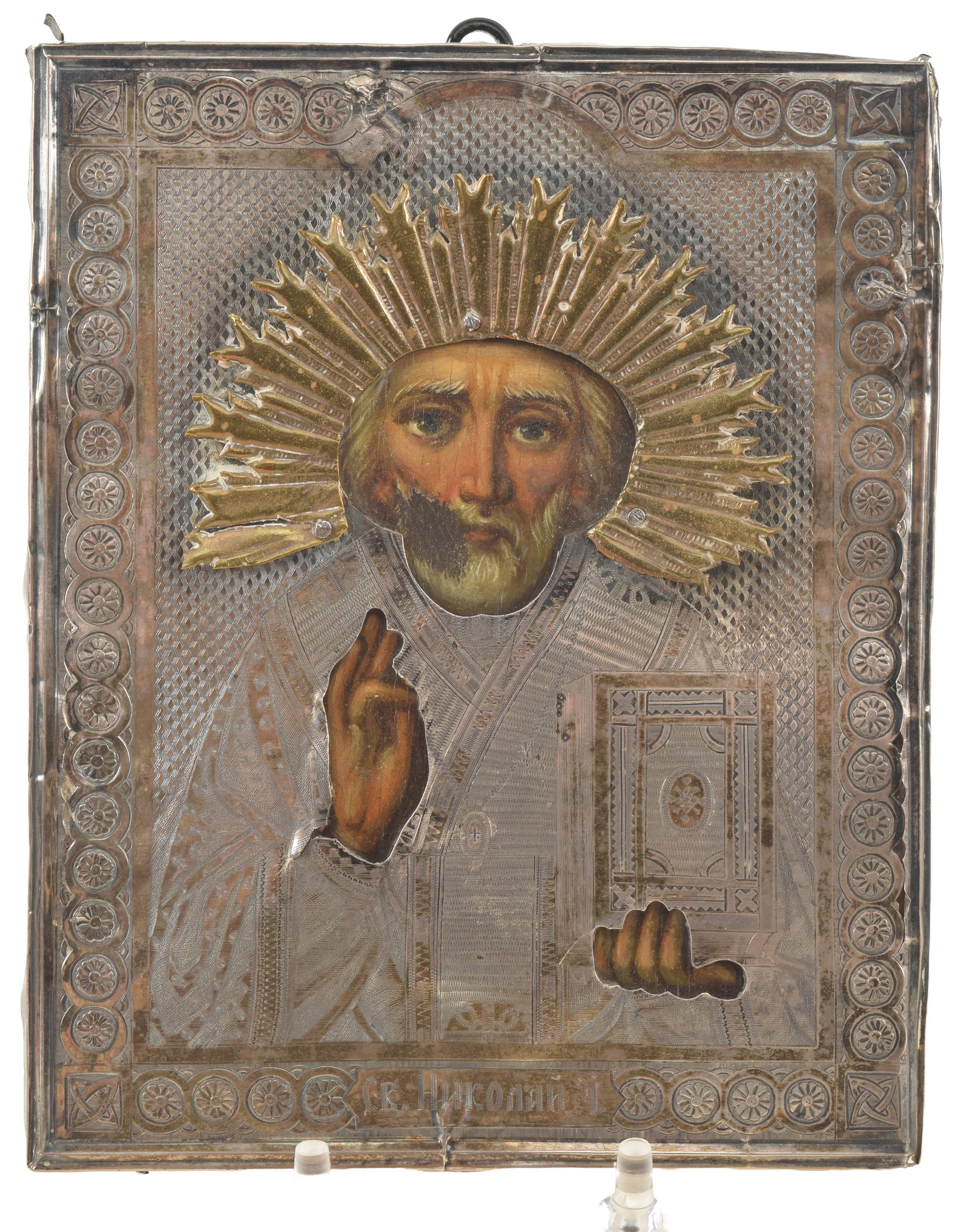 Antique Russian silver mounted religious icon. Applied halo. Minor damages to silver. Hallmarked on (1 of 6)