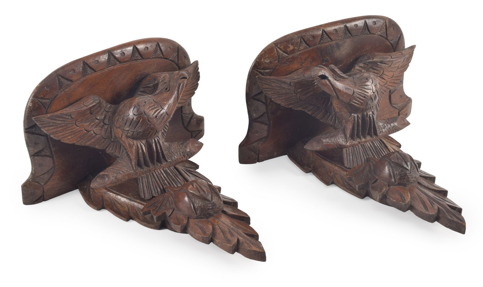 Pair of Bellamy style eagle carved wood wall brackets. Perched eagle above leaf decoration with (1 of 6)