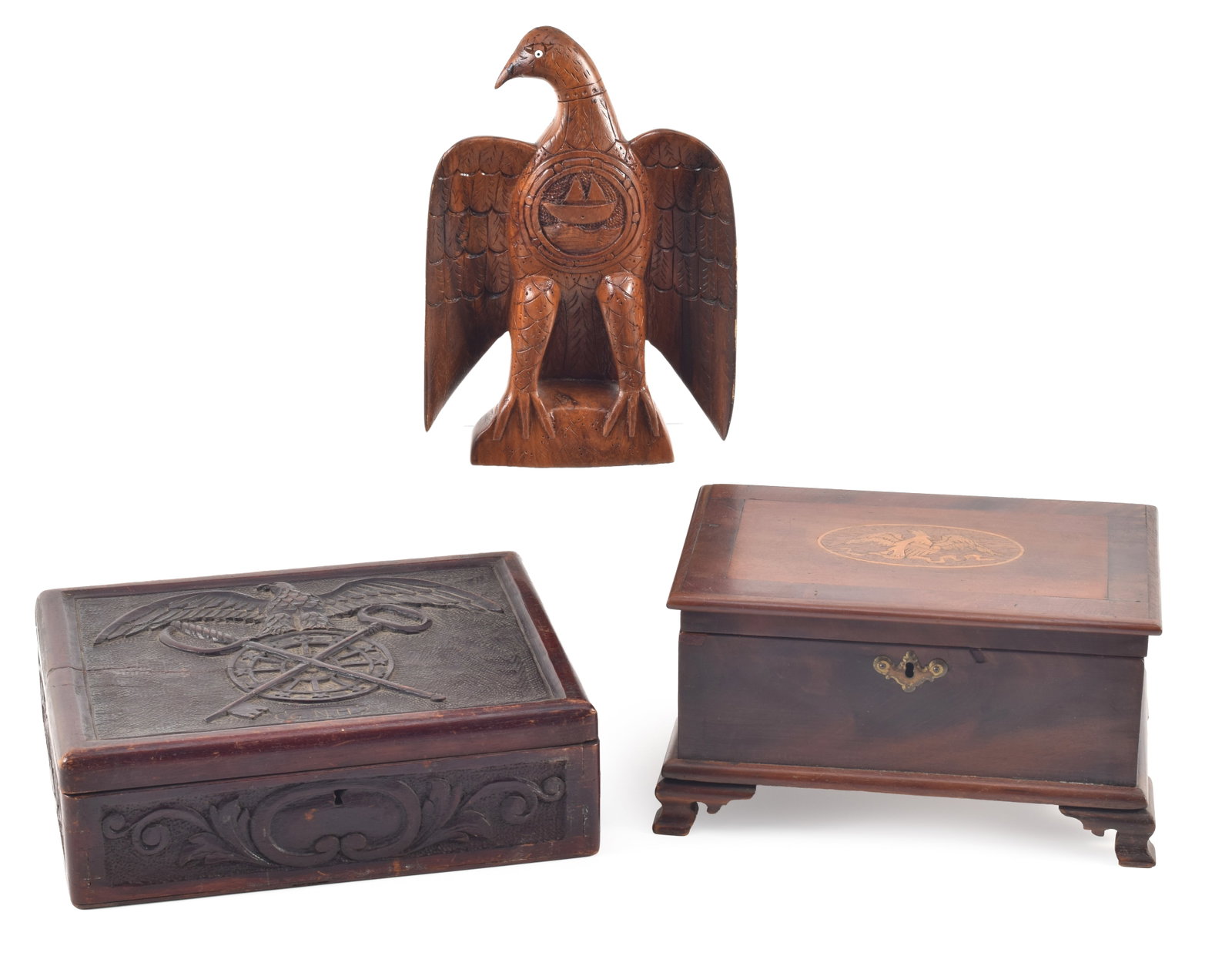 3 antique patriotic carved items. 1) American eagle with glass bead inlaid eyes and carved ship: 3 antique patriotic carved items. 1) American eagle with glass bead inlaid eyes and carved ship motif on chest. 9.25in high. 2) Carved wood box with U.S. Army quartermaster sigil on lid. 10in wide. 3)