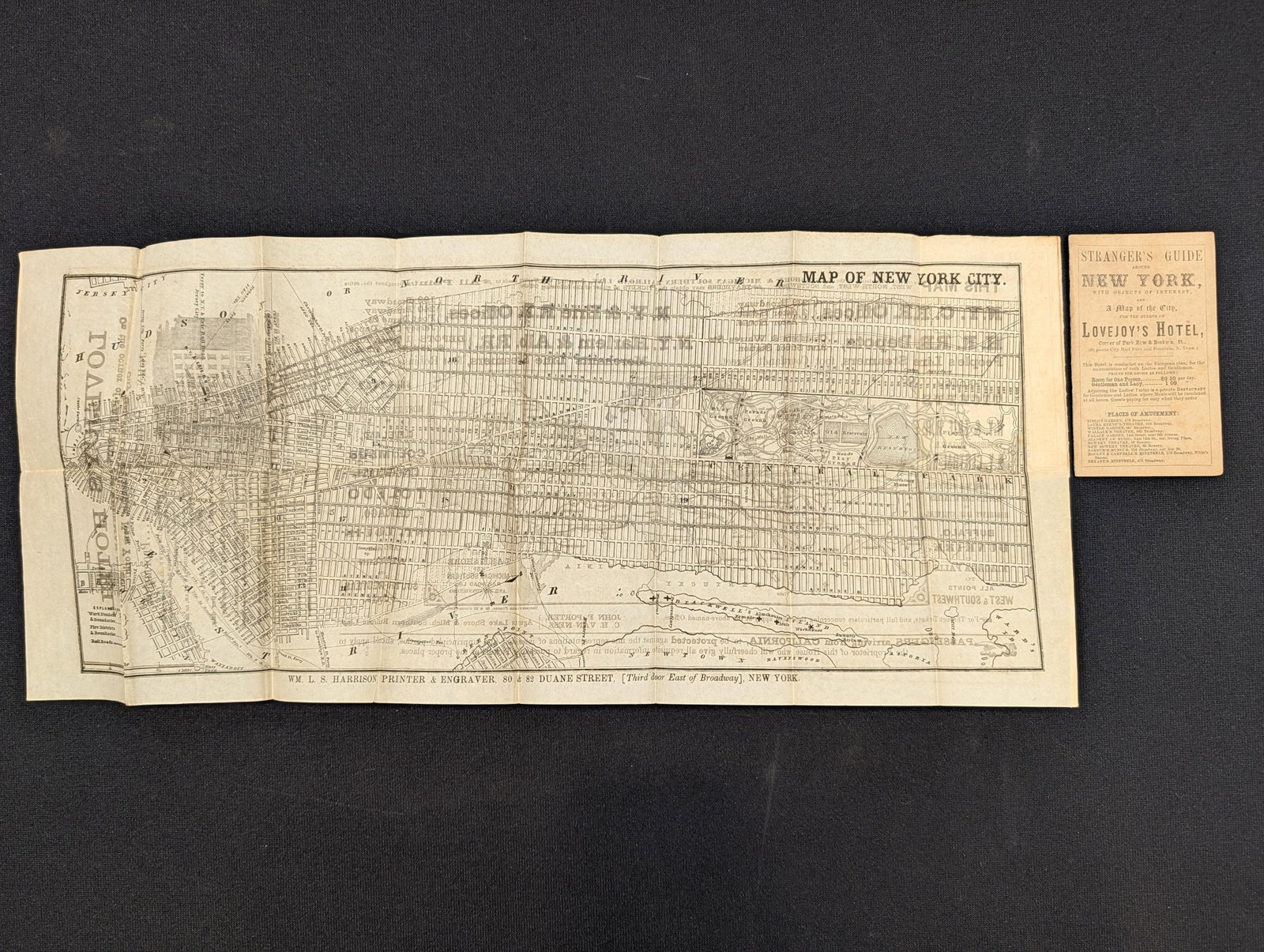 Stranger's Guide Around New York, A Map of the City for Guests of Lovejoy's Hotel, ca. 1880.: Stranger's Guide Around New York, A Map of the City for Guests of Lovejoy's Hotel, ca. 1880. Engraved by Wm. L. S. Harrison. Fold-out map of New York City from Manhattan to the end of Central Park. Re