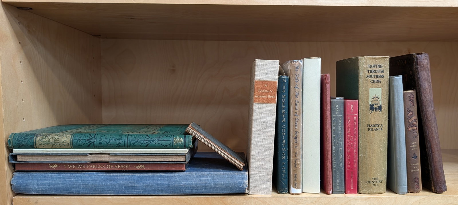 Lot of antique books. To include: album of early 1900s Grand Tour post cards, early 1800s ledger, (1 of 3)