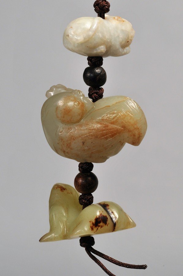 Jade pendant. China. 19th century or earlier. Composed (1 of 4)