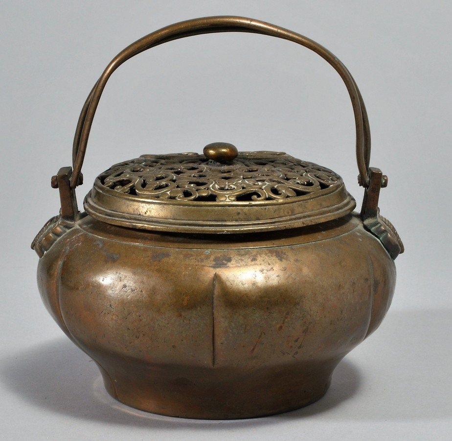 Brass Hand Warmer. Japan. 19th century. Cover cast and (1 of 8)