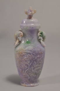 19th/20th century Chinese carved Lavender Jadeite: 19th/20th century Chinese carved Lavender Jadeite Elephant handled covered vase with Phoenix and Floral branch decoration. Cover with bird and branch decoration. Small part to branch missing near bird