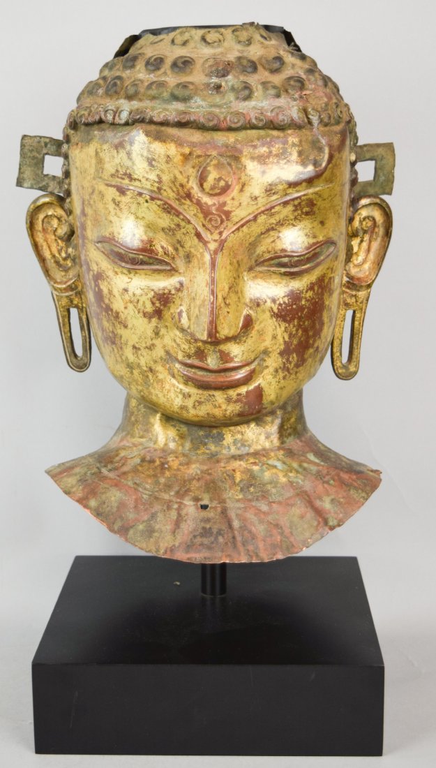 Repousse copper head of the Buddha. Tibet. 18th cent. (1 of 10)