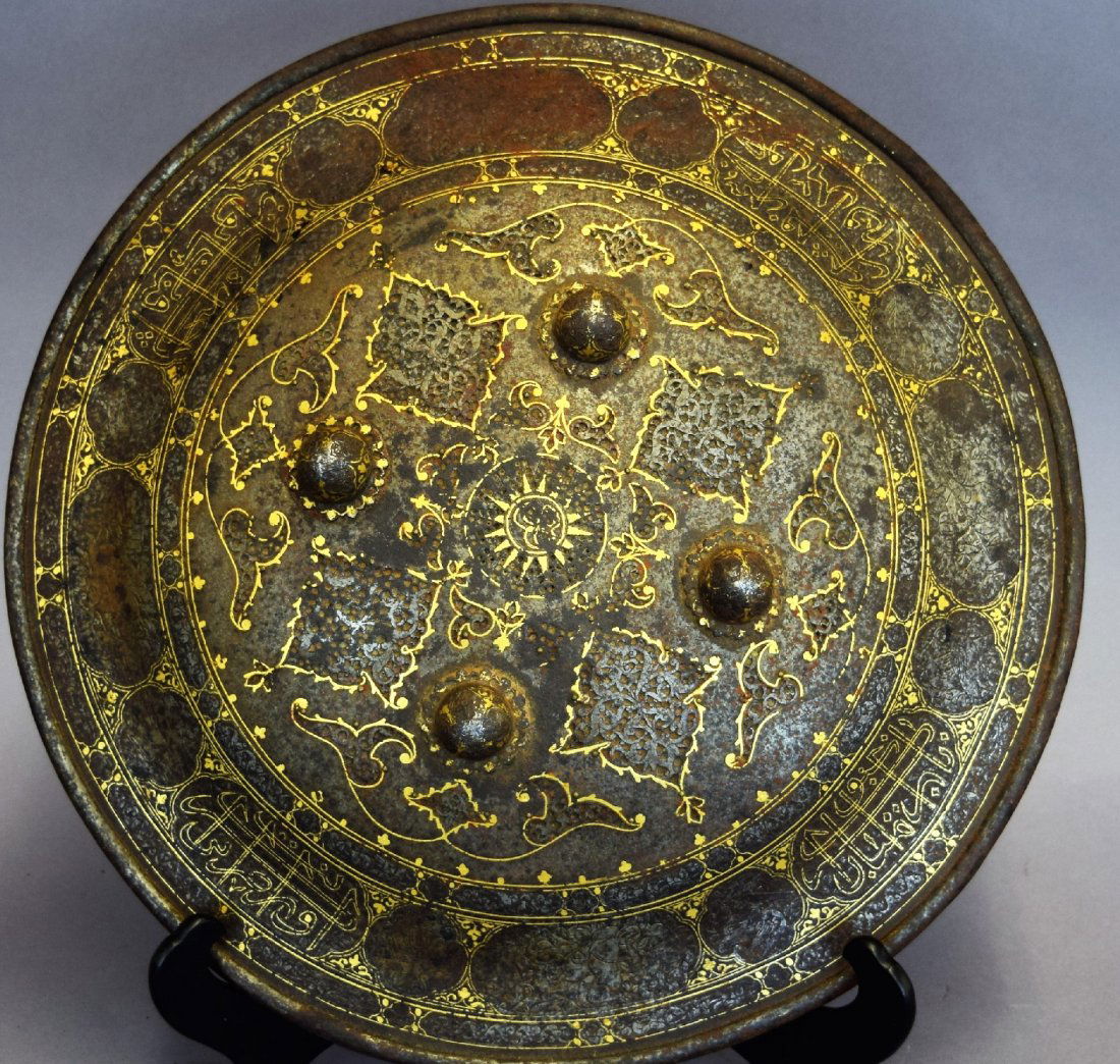 Shield. Persia. 19th century. Steel with gold inlay of (1 of 8)