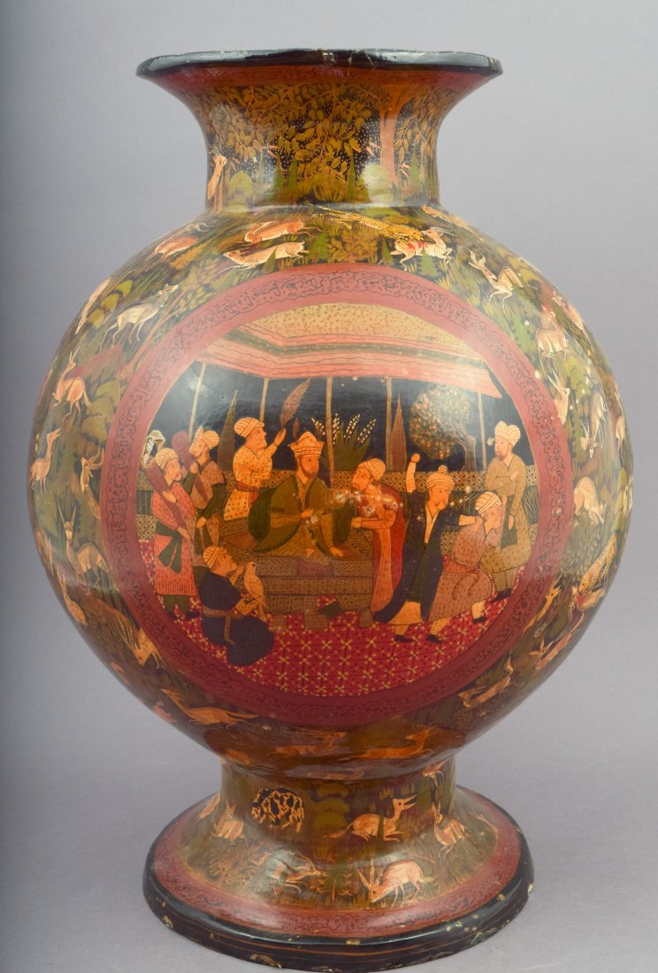 Lacquer vase. Kasmir. Early 20th century. Pomegranate: Lacquer vase. Kasmir. Early 20th century. Pomegranate form. Decoration of Mughal court scenes, animals and inscriptions. 17" h. This item may have additional high-resolution photographs, available to 