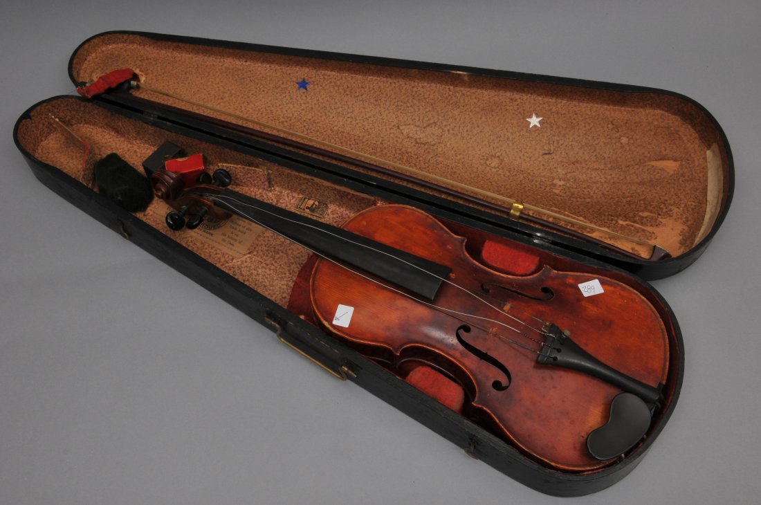 George E. Bryant Violin. In case with bow. Violin- 24".: George E. Bryant Violin. In case with bow. Violin- 24". Inscribed on label inside case- "Geo E. Bryant Lowell, Mass 1893. Chip to upper left. Housed in G.S.B. case. Unmarked bow. Length of back- 14".