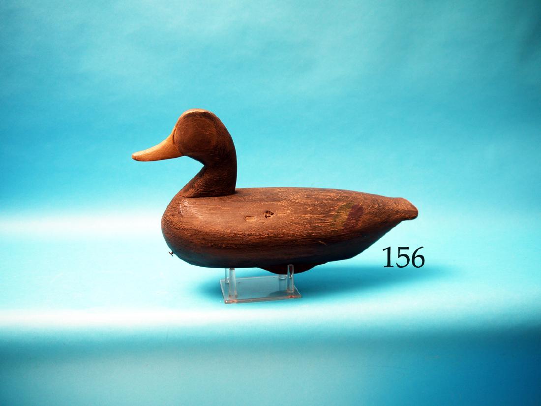 FINE BLACK DUCK by Chandler Sawyer, Currituck, NC.: FINE BLACK DUCK by Chandler Sawyer, Currituck, NC. Fine contemporary carving in excellent paint and unused condition. Retains foundry weight. Branded CS on bottom. A fine rendition of an Outer Banks c