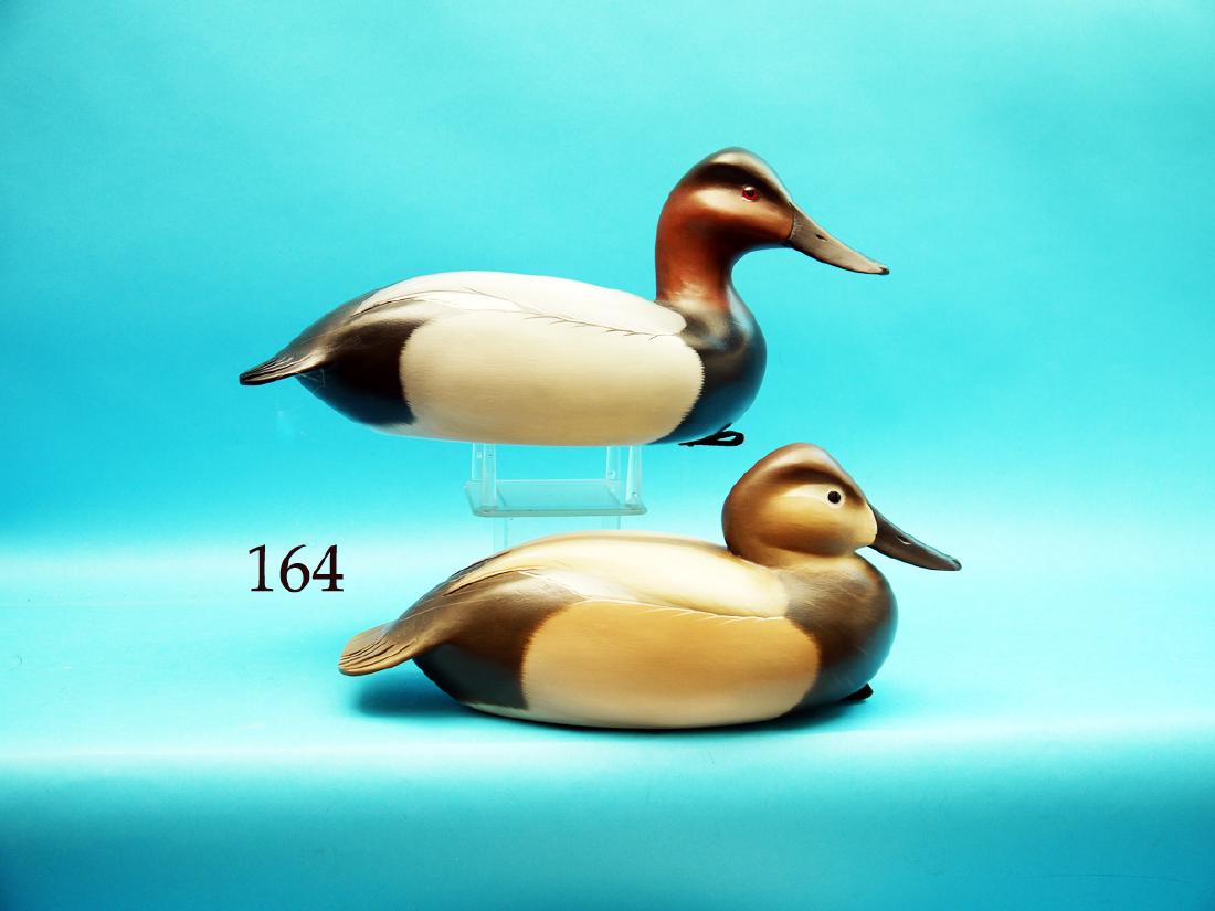 VERY FINE PAIR OF CANVASBACKS by Matt Geis, Cherry: VERY FINE PAIR OF CANVASBACKS by Matt Geis, Cherry Hill, NJ. Excellent original paint and unused condition. Both hollow. Painted feather detail. Slightly raised wing tips. Drake with head turned sligh