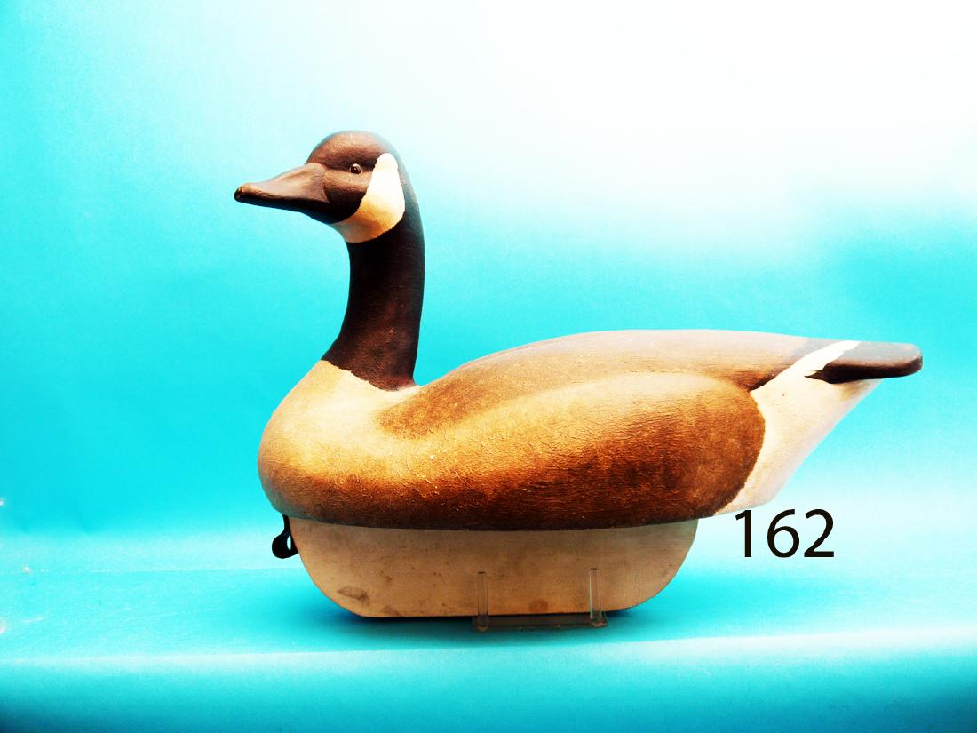 CANADA GOOSE by Gary Doviak, Perth, NY. Very good: CANADA GOOSE by Gary Doviak, Perth, NY. Very good original paint and unused condition. Hollow construction. Head turned slightly left. Relief-carved wings. Full deep water keel. Signed and dated 1986.