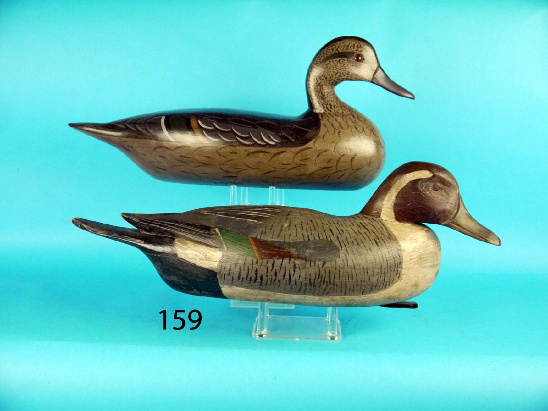 PINTAIL HEN by Charles Moore, carved in the Illinois: PINTAIL HEN by Charles Moore, carved in the Illinois River style. Excellent original paint and condition. Together with a PINTAIL DRAKE carved in the Delaware River tradition. Good original paint with