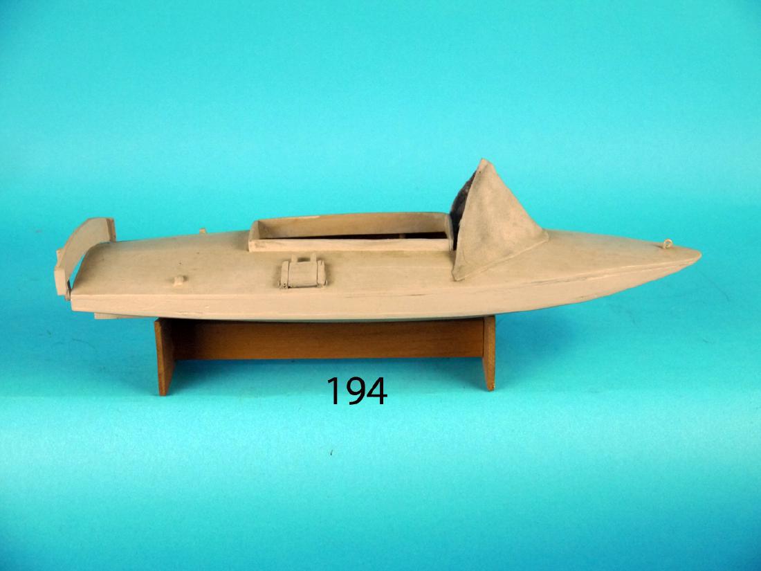 BARNEGAT BAY SNEAK BOX MODEL. Good structural: BARNEGAT BAY SNEAK BOX MODEL. Good structural condition. Retains spray screen and oar locks. One stern cleat missing. Custom base
