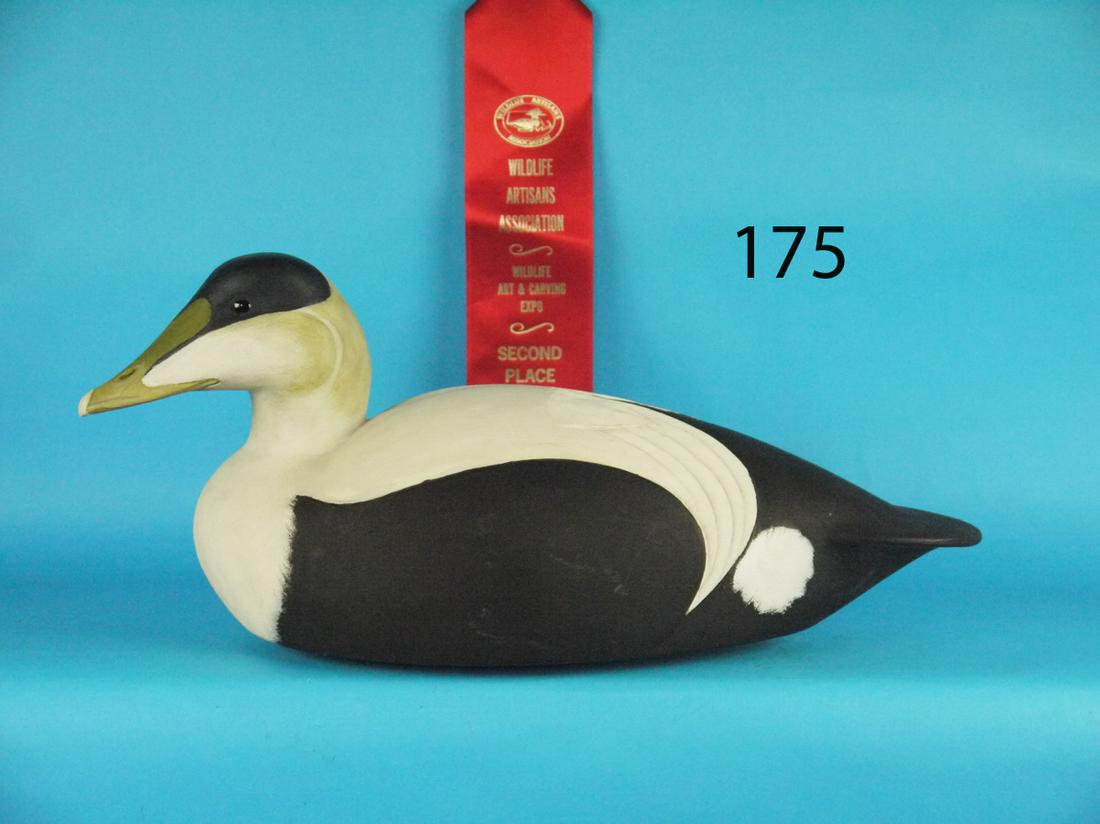 COMPETITION EIDER, F.C. WILSON: FINE COMPETITION EIDER by Massachusetts carver Frank C. Wilson. Excellent original paint and condition. Hollow construction. Carved wing detail and fine carving to bill. Retains 2nd place ribbon from 