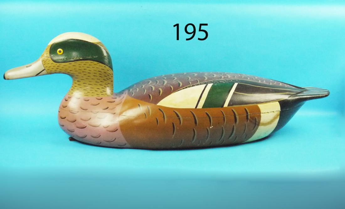 OVERSIZED WIDGEON PAIR: UNUSUAL AND RARE OVERSIZED WIDGEON PAIR. Both in very good original paint and condition. Both hollow construction. Both approximately 36 inches in length. From the Window Decorating Department, Lord &
