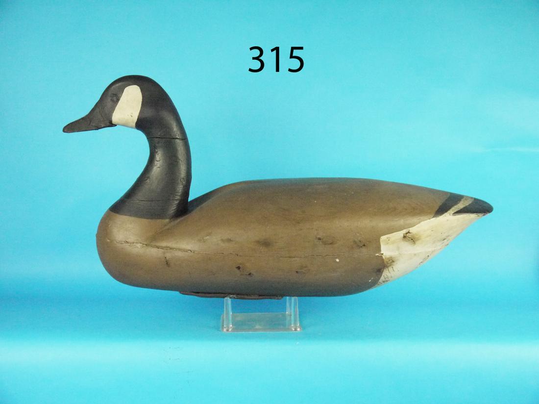 CANADA GOOSE, LONG BEACH ISLAND, NJ: EARLY CANADA GOOSE, Long Beach Island, NJ. Old working paint and very good structural condition. Deep ice groove to back. Old repairs to neck and back. Branded C. FENIMORE. From the exclusive Peahala 