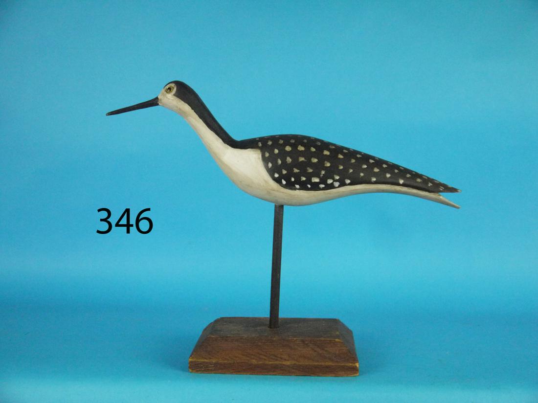 DECORATIVE STILT: DECORATIVE FOLK ART STILT in excellent original paint and unused condition. Raised split wing tips. Retains glass eyes. Mounted atop a custom base. 100-200