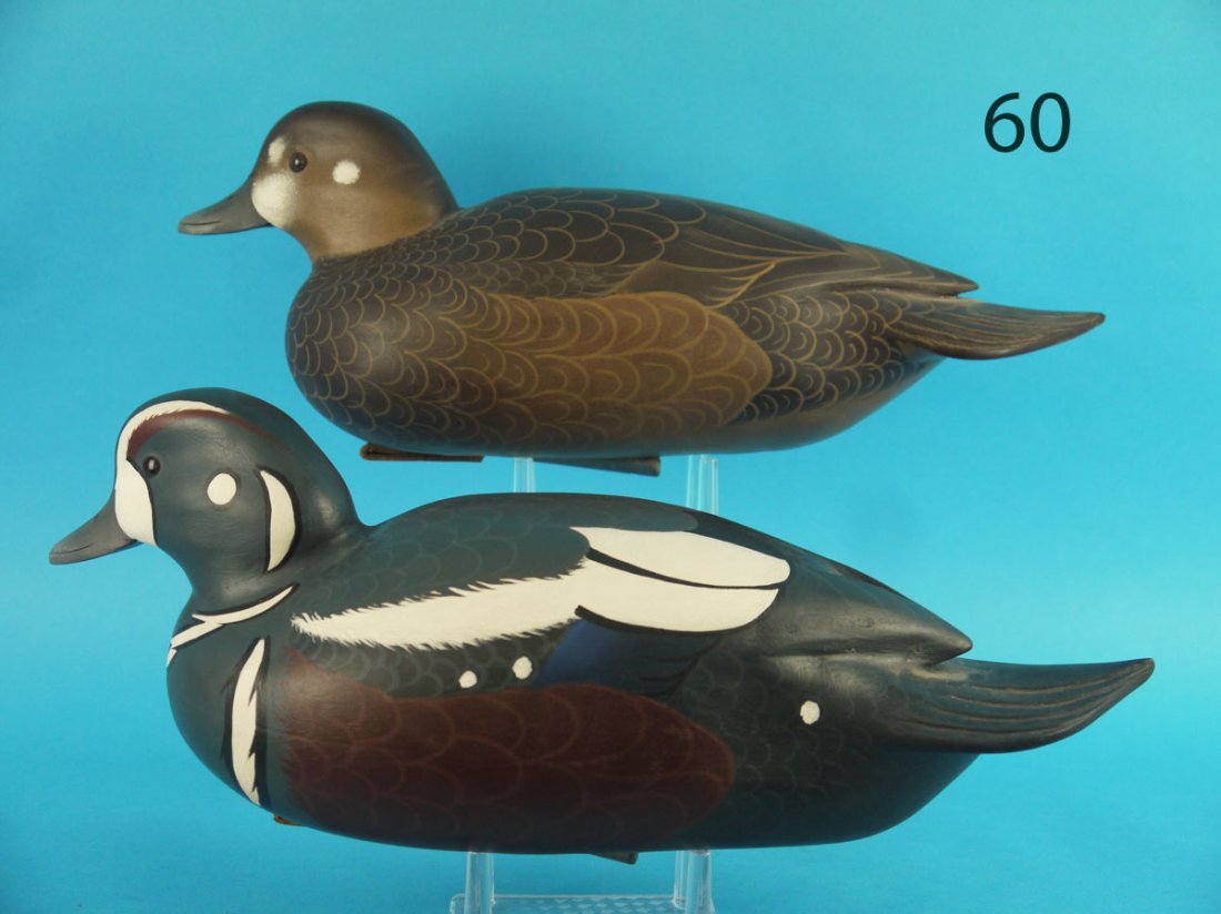 HARLEQUIN PAIR, J. WOOD: RARE PAIR OF HARLEQUINS by John Wood, Trenton, NJ. Excellent original paint and condition. Hollow construction. Detailed painted feather work. Both carved in a swimming position with raised carved win