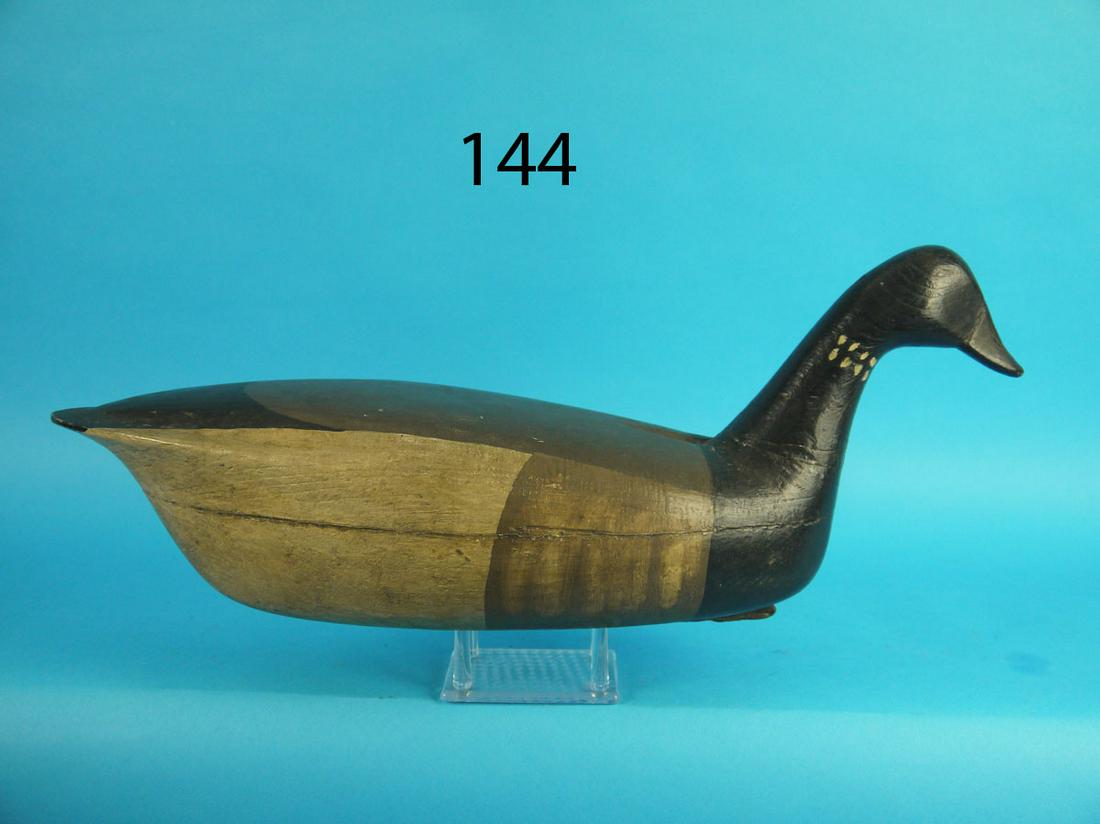 BRANT, ROY MAXWELL: BRANT by Roy Maxwell, Wading River, NJ. Restored paint and very good structural condition. Some tight checks in bottom. Carved in a swimming position. Deep ice groove carving to back. Retains inlet we