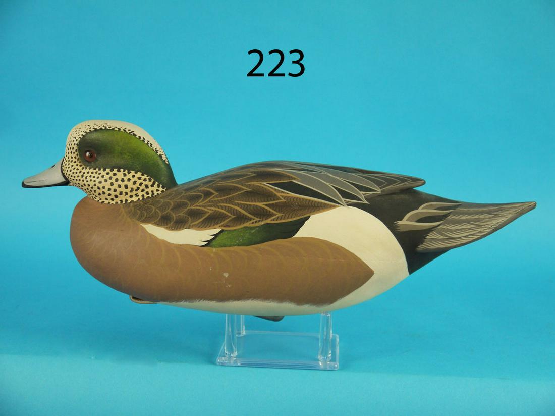 WIDGEON DRAKE, J. WOOD: RARE SWIMMING DRAKE by John Wood, Trenton, NJ. Exceptionally fine paint and structural condition. Hollow construction. Raised carved wing tips and elongated fluted tail. Head carved in a swimming posi