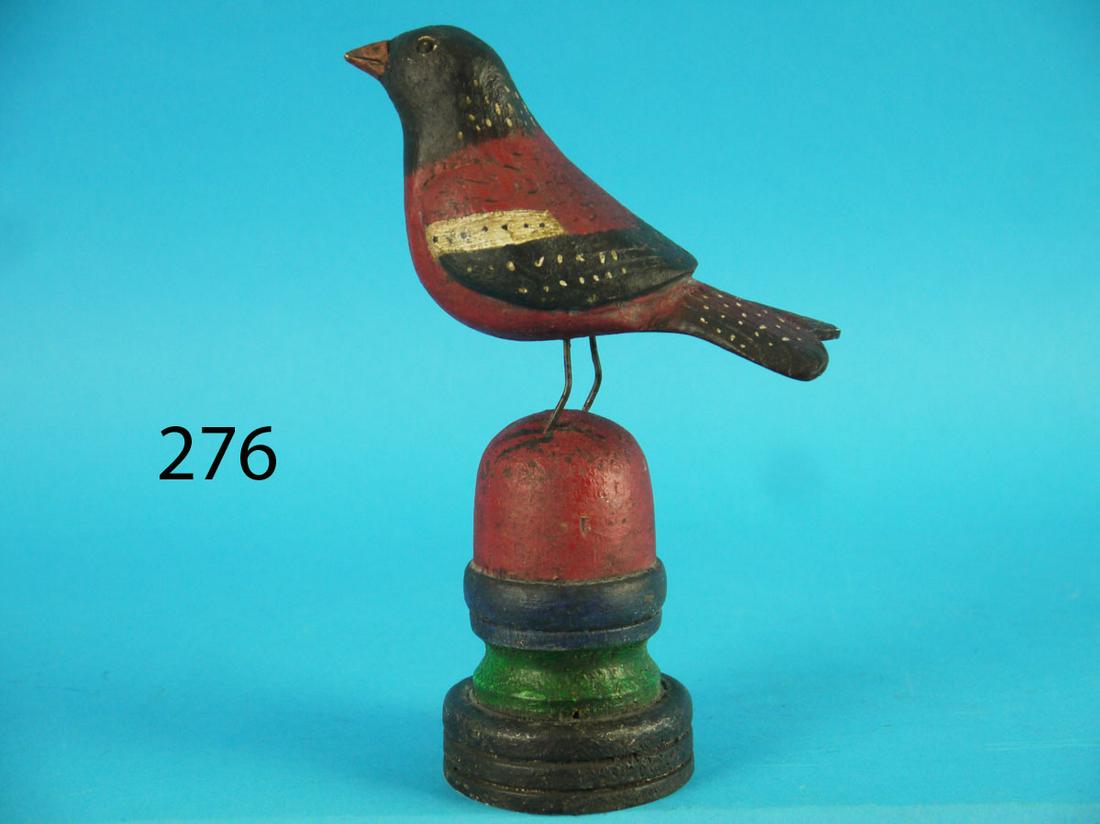 ROBIN, K. KIRBY: FOLK ART ROBIN by Ken Kirby, Little Egg Harbor, NJ. Very good antiqued original paint and condition. Heart-shaped relief-carved wings and broad split tail. Overall height approximately 7 1/2 inches. M