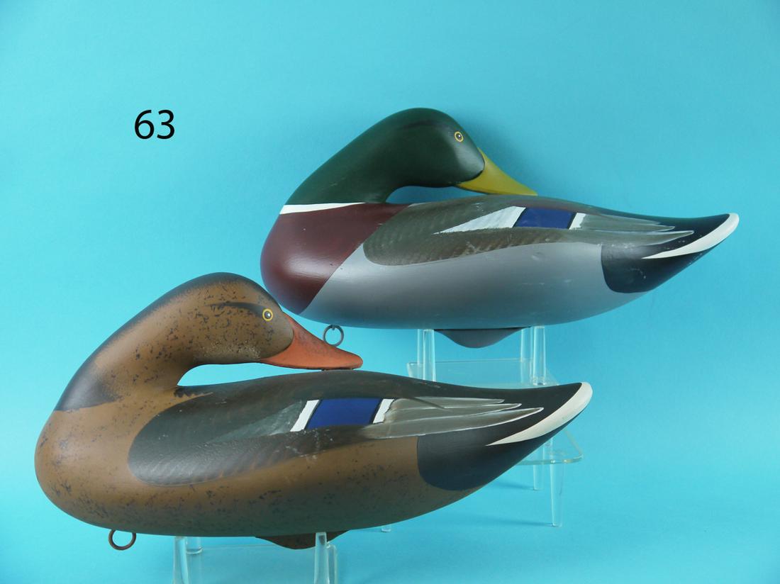 MALLARD PAIR, D. WALKER: FINE PAIR OF PREENING MALLARDS by Dave Walker, Havre de Grace, MD. Very good original paint and unused condition. Detailed painted feather work to backs. Both retain keel weights, rings and staples. S