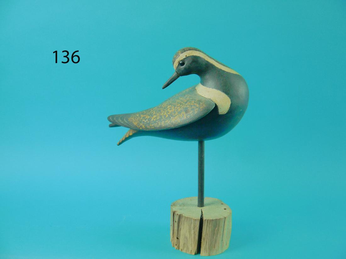 GOLDEN PLOVER, S. MOREY: RARE GOLDEN PLOVER by Steve Morey, Tuckerton, NJ. Rare raised-wing model carved with the bird preening wing feathers. One wing with deep relief carving. Raised wing tips and split tail carving. Detail