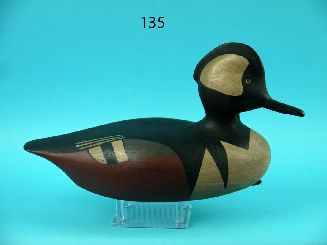 HOODED MERGANSER DRAKE, F. DOBBINS: HOODED MERGANSER DRAKE by Frank Dobbins, Jonesport, ME. Excellent original paint and structural condition. Fine crest carving to head and detailed bill carving. Painted speculums. Retains Sotheby's sa
