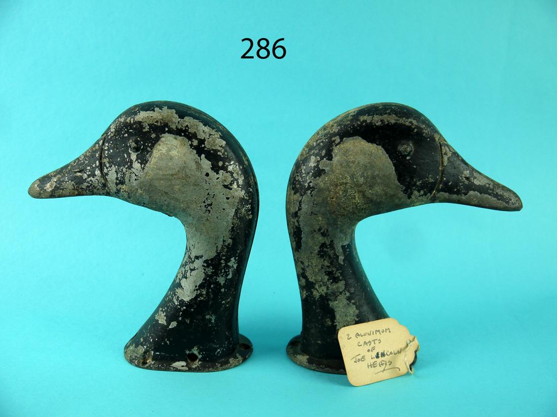 TWO JOE LINCOLN CAST METAL HEADS (1 of 3)