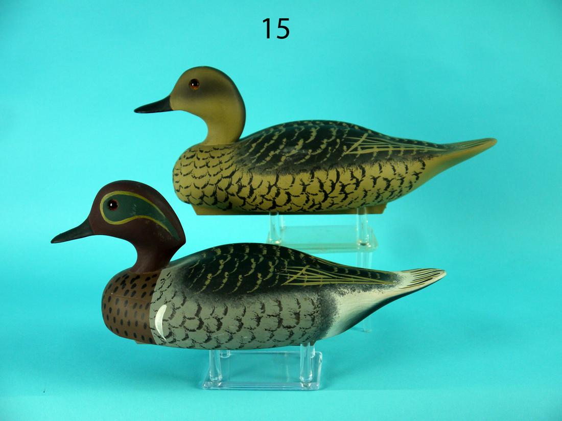 GREEN WING TEAL PAIR, WILDFOWLER: EXCEPTIONAL PAIR OF GREEN WING TEAL by the Wildfowler Decoy Company, Pt. Pleasant, NJ. Gunning models in excellent original paint and condition. Relief-carved wings and elongated tails. The drake with
