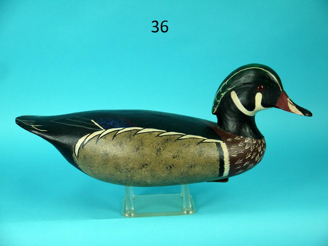 WOOD DUCK DRAKE, J. HAMILTON: WOOD DUCK DRAKE by John Hamilton, Cedar Run, NJ. Excellent original paint and unused condition. Hollow construction. Head turned slightly right. Painted feather detail overall. Head with carved crest 