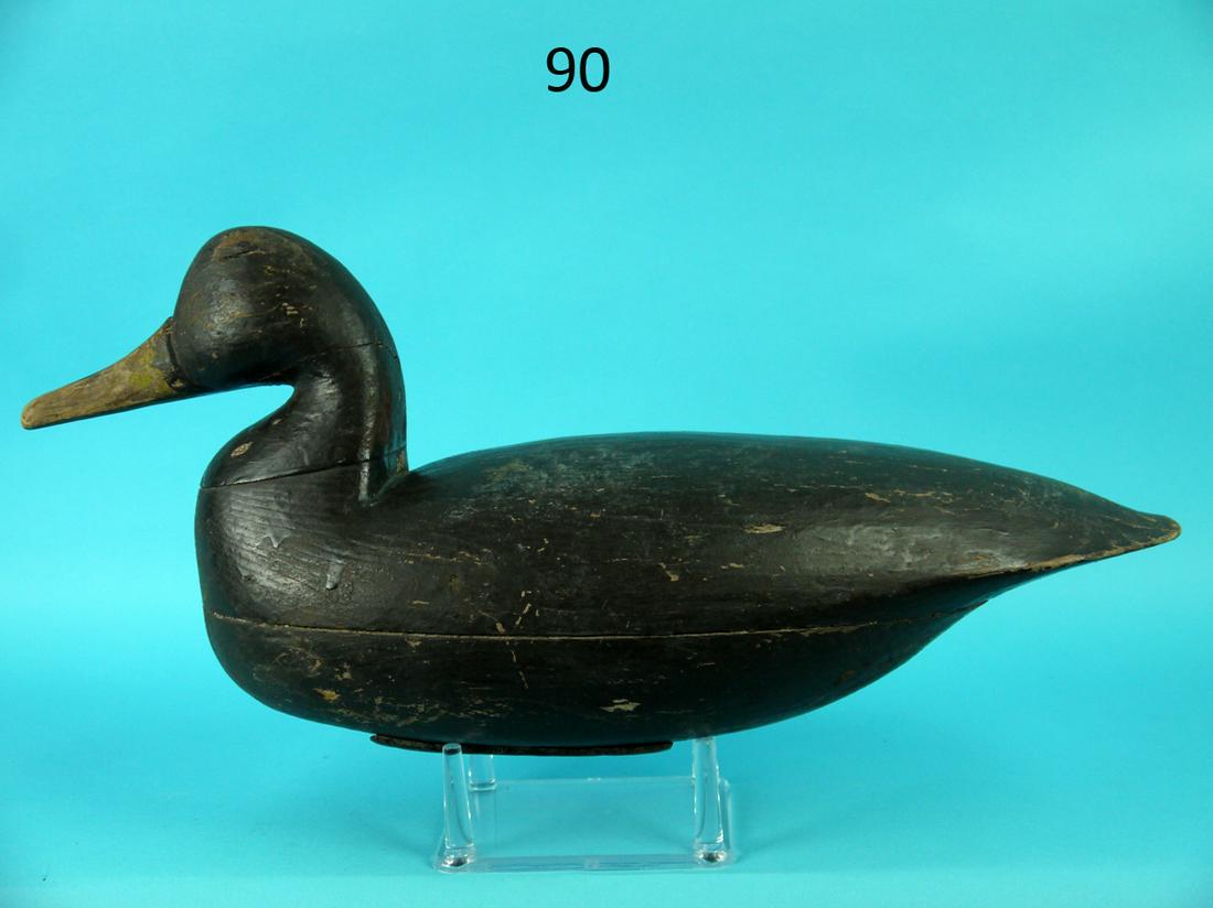 BLACK DUCK, J. KING: EARLY BLACK DUCK by Joe King, Manahawkin, NJ, circa 1900. Very good working repaint and structural condition. Tight check to neck. Hollow construction. Retains pad weight. Overall length is approximat